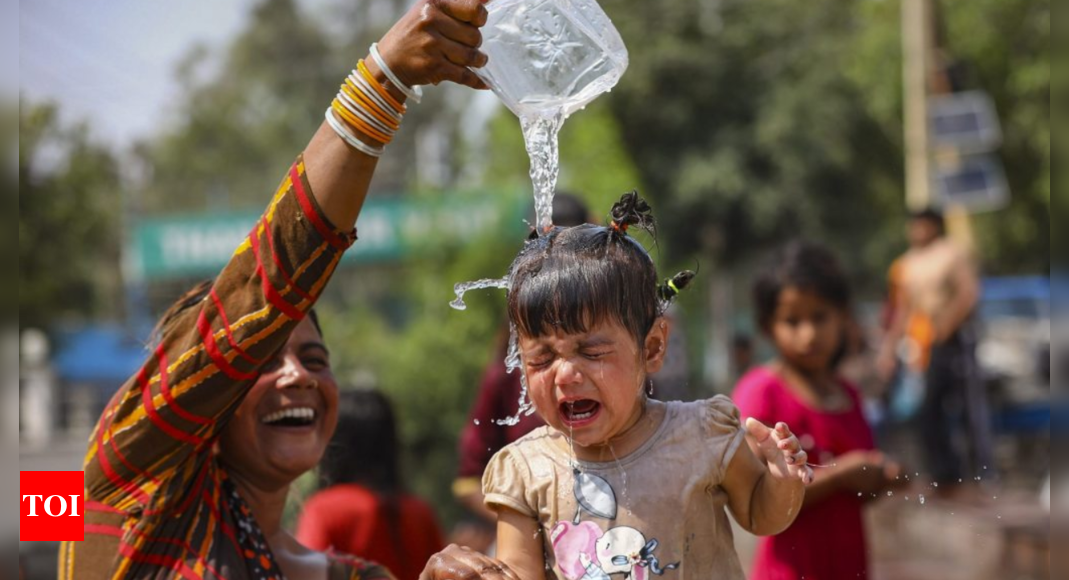 Mercury crosses 45°C in North India, IMD issues heatwave warning as temperatures set to rise over next 5 days | India News – Times of India