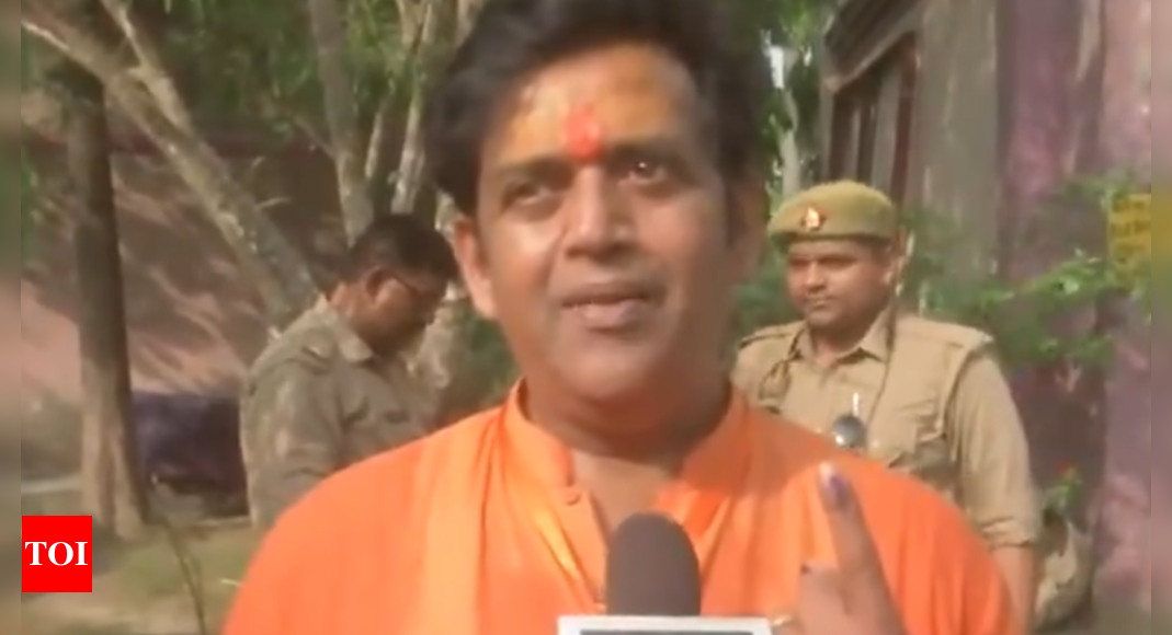 ‘We are not VIP’s..’ Gorakhpur BJP candidate Ravi Kishan queues up to cast his vote | India News – Times of India
