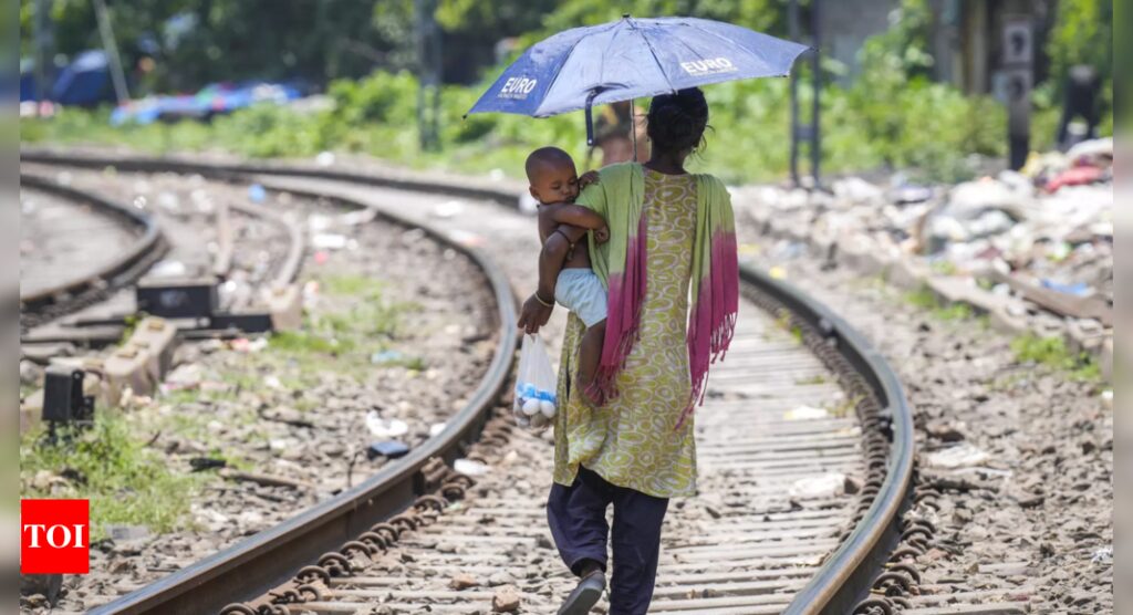 Fighting for survival: Climate change-fuelled heat pushes poor women to limits of endurance | India News – Times of India