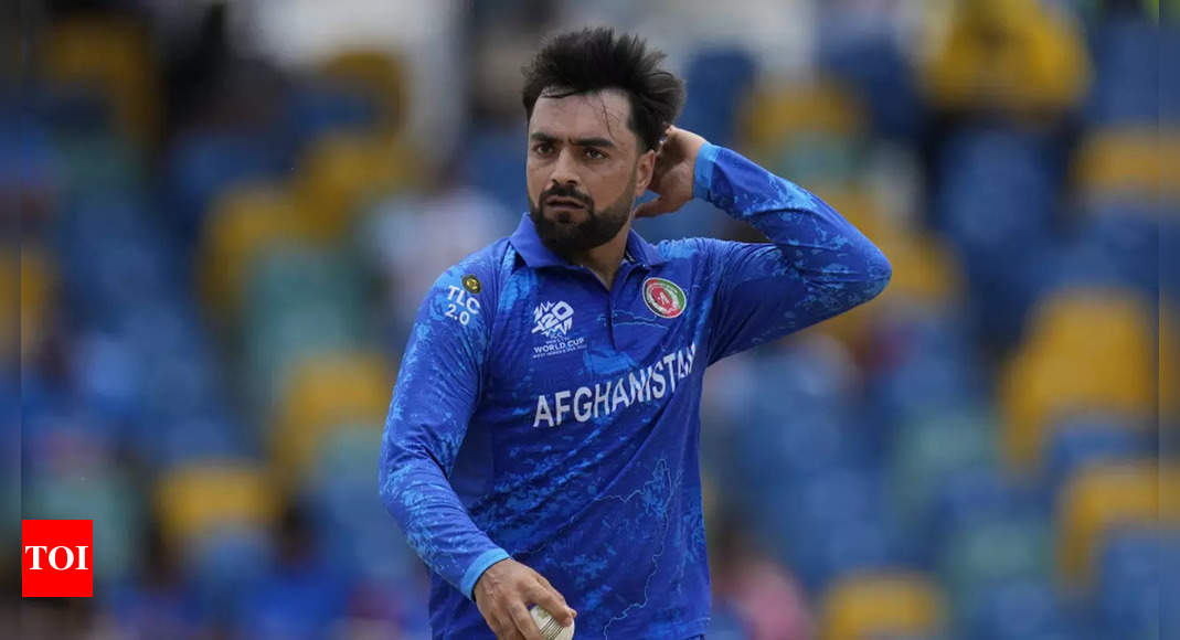 ICC reprimands Rashid Khan for throwing bat on the ground during T20 World Cup match | Cricket News - Times of India