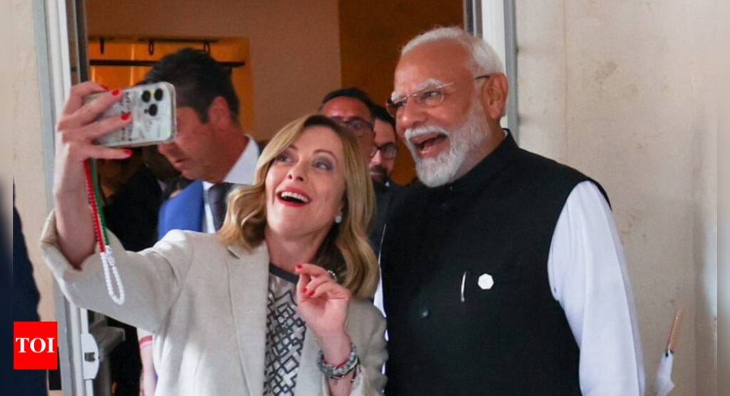 Italy’s PM Meloni clicks selfie with PM Modi at G7 Summit | India News – Times of India