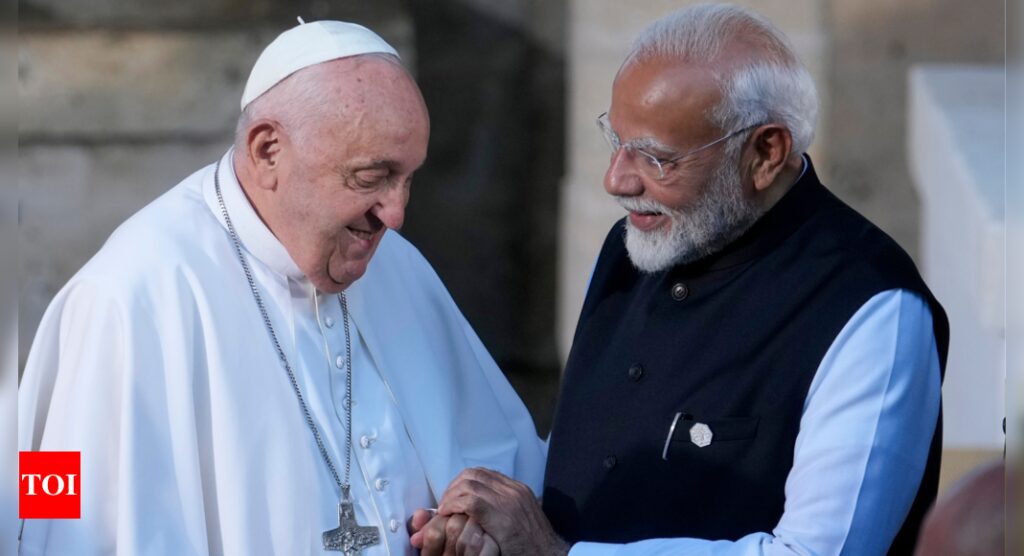 Pope-Modi picture: Congress issues apology, but targets PM | India News – Times of India