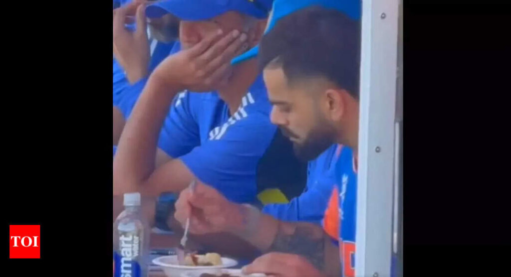 Watch: Virat Kohli mutes himself to cheers to focus on food in dugout at T20 World Cup | Cricket News – Times of India